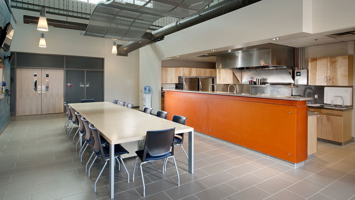 The kitchen and dining spaces open into each other for ease of circulation and flow.