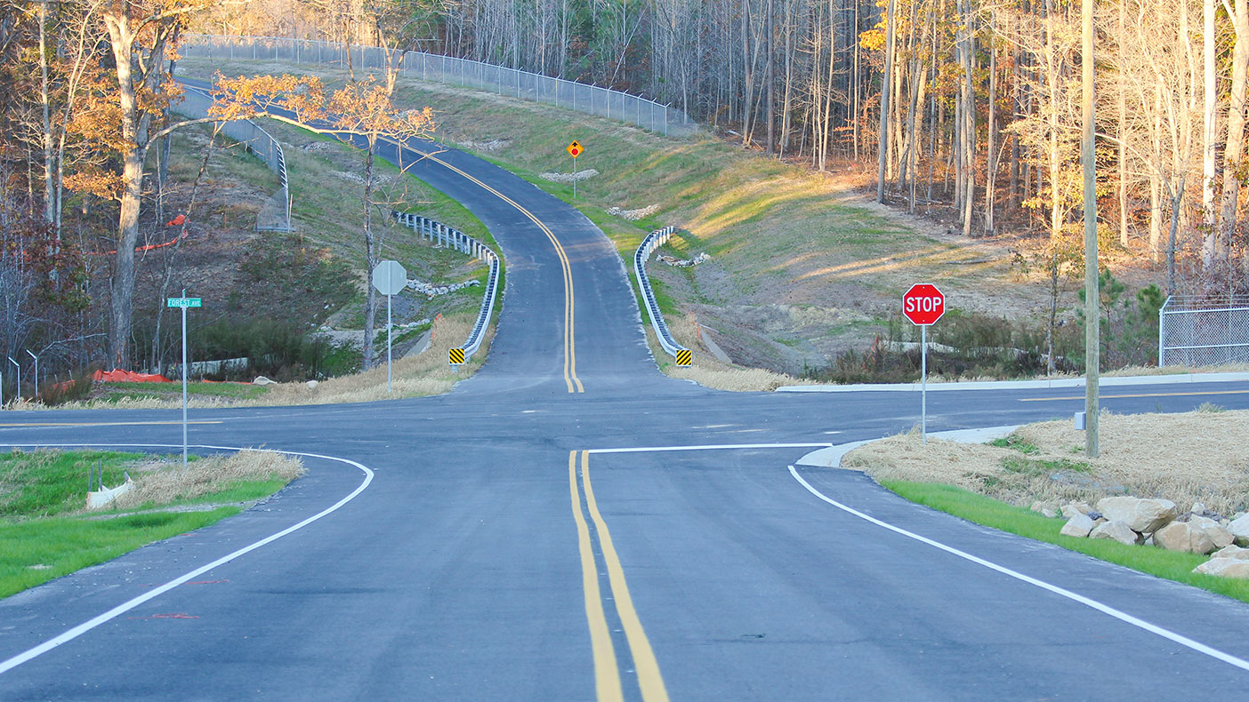 New training tracks feature a variety of road configurations: a cloverleaf ramp, city intersections, interstate acceleration lanes, a roundabout, railroad tracks, 25,000-square-foot skidpan, cul-de-sacs, and 342,000-SF precision-driving course.