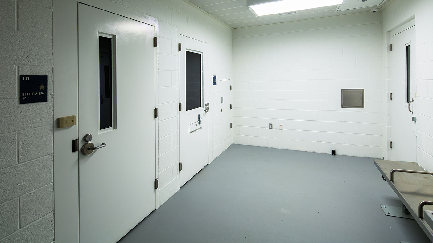 The facility also includes multiple secure holding cells. 