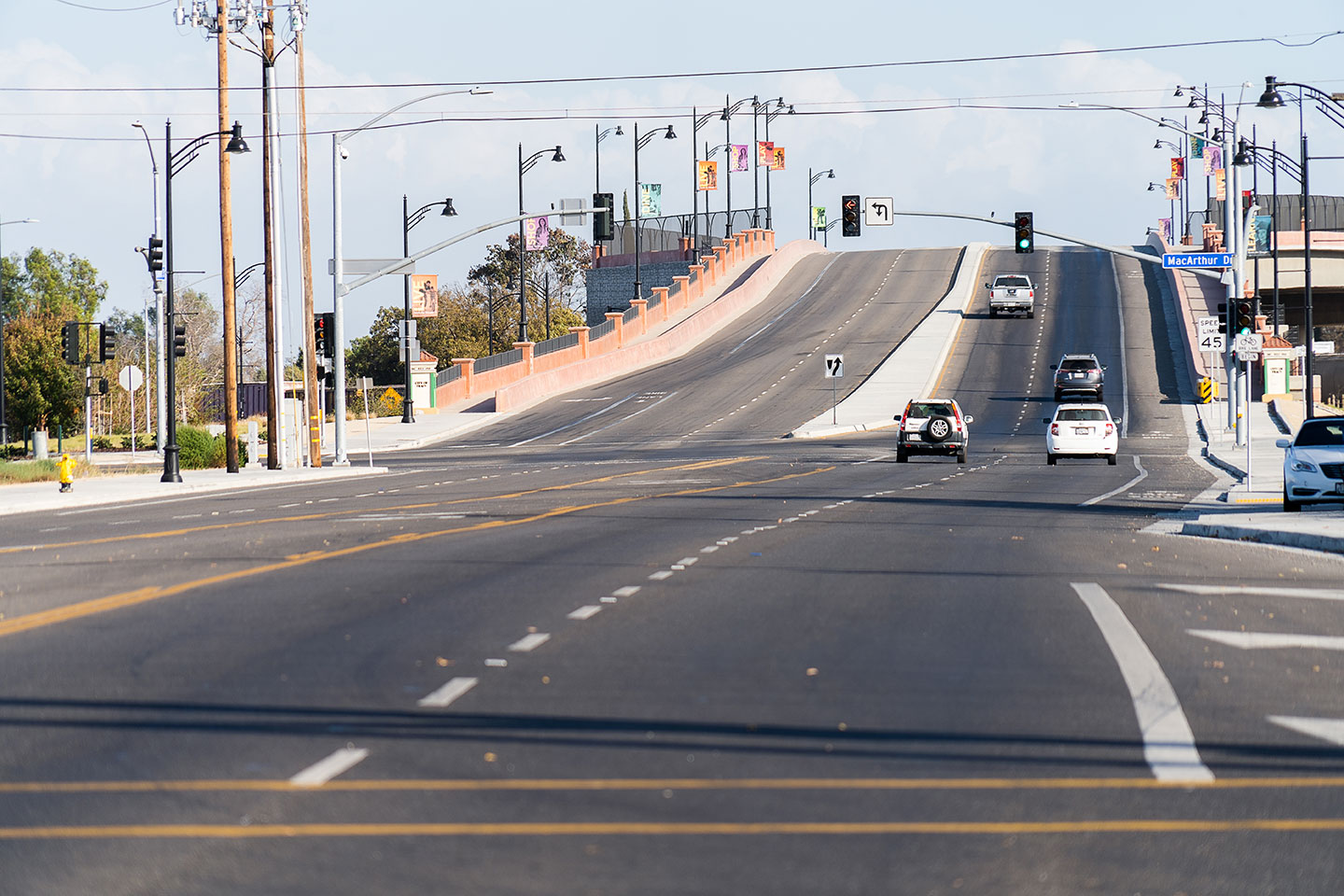 The superstructure of the replacement bridge consists of a cast-in-place, post-tensioned concrete box girder. The bridge is a single-span structure with an overall bridge length of approximately 291 feet.