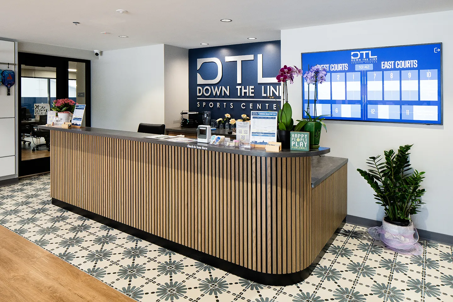 The entryway welcomes visitors and connects them directly to the center’s amenities.