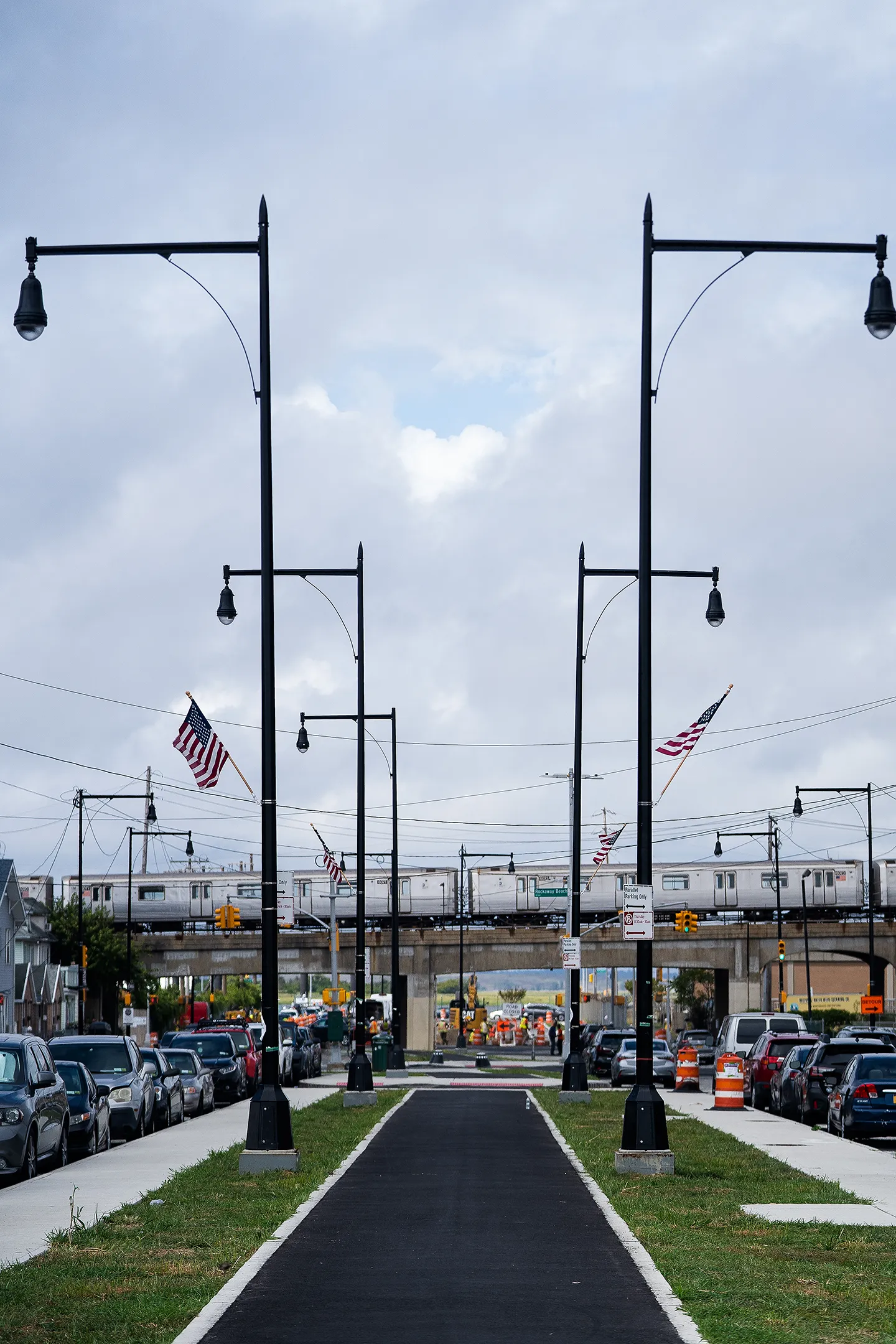 New bike lanes in the median separate bicyclists from pedestrians and vehicular traffic.