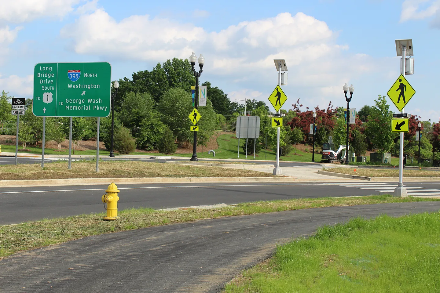 The project improved paths for pedestrians and bicyclists with enhanced pedestrian safety signing and pavement markings.