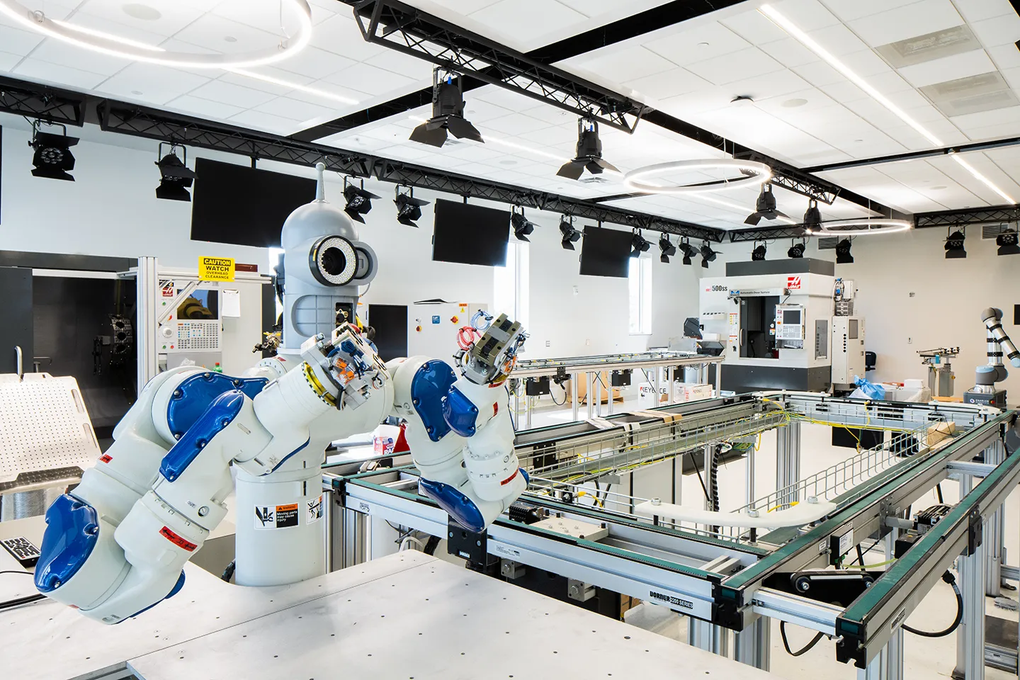 The Industry 4.0 Integration Lab is an advanced, autonomous manufacturing work cell equipped with various robots and computer numerical control (CNC) machines.