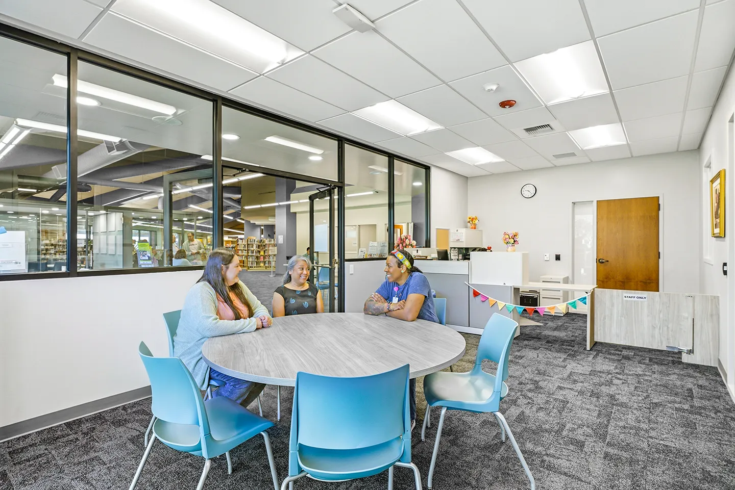 To improve safety for their patrons, the library staff area has improved sightlines into modular study pods.