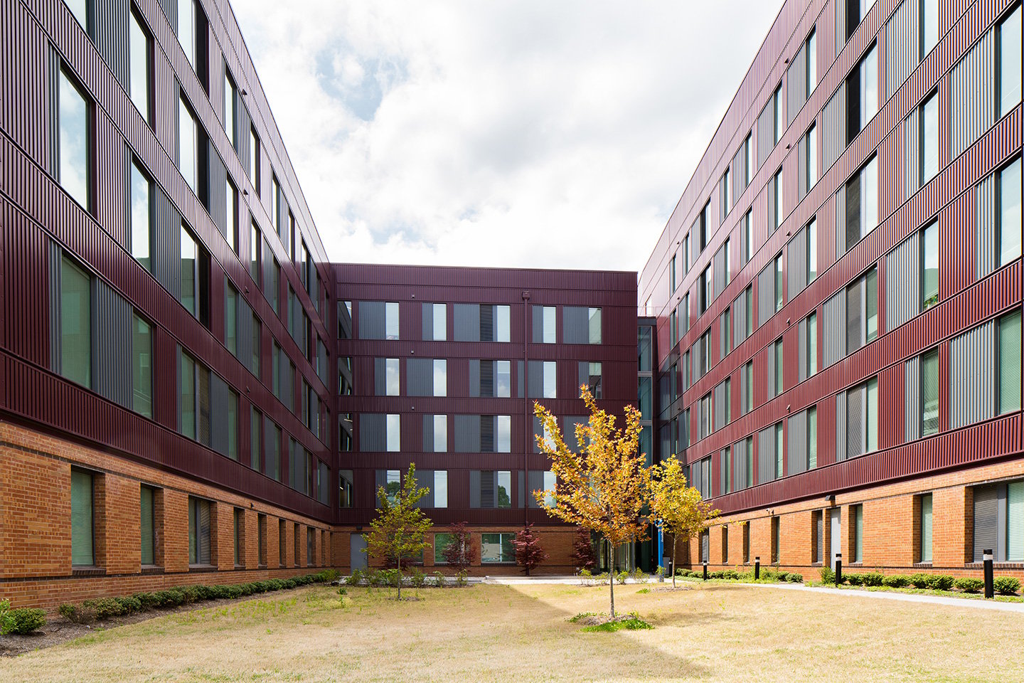 The new housing offers a courtyard for students to relax and enjoy the outdoor space.