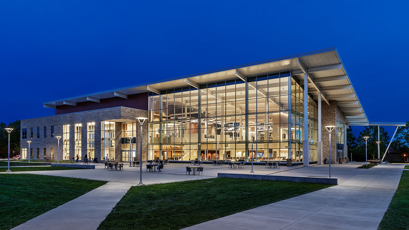 The building’s prominent location, simple forms, sloped green roof, lighting, and transparency make the union an icon on campus.