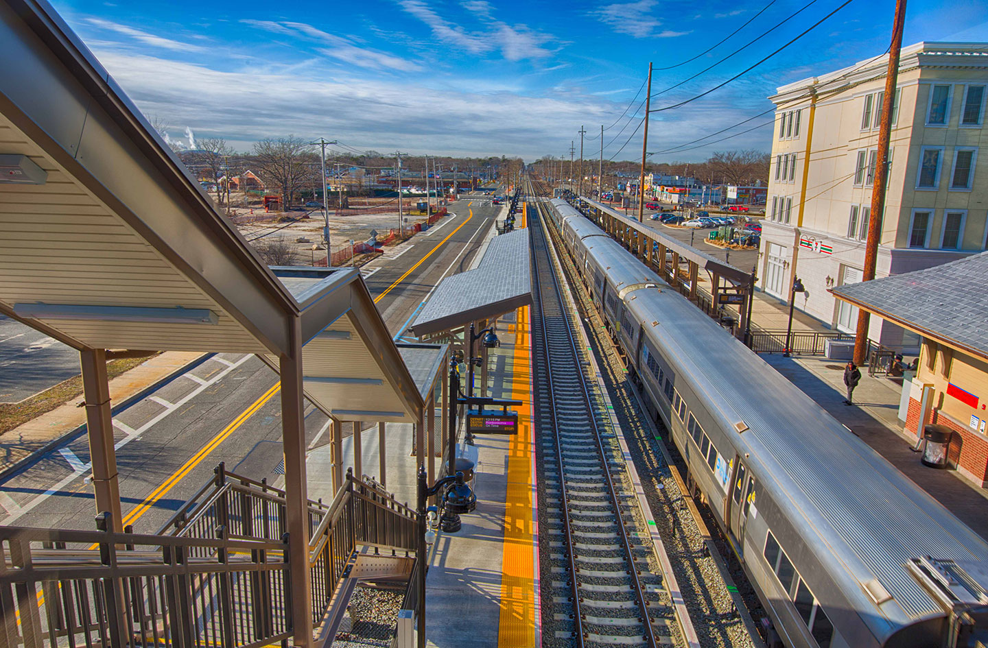 Station improvements included a pedestrian overpass with ADA-compliant elevators, new stairs, new canopies, and new platform shelters.