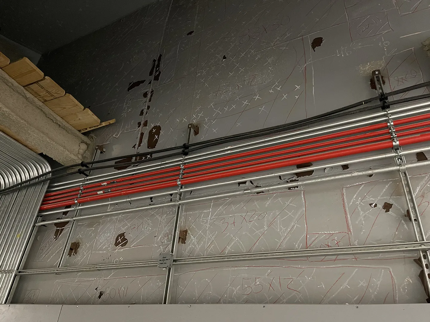 Acoustic testing performed on the Central Fan Plant helped to locate and seal voids between the steel blast plates and concrete surface.